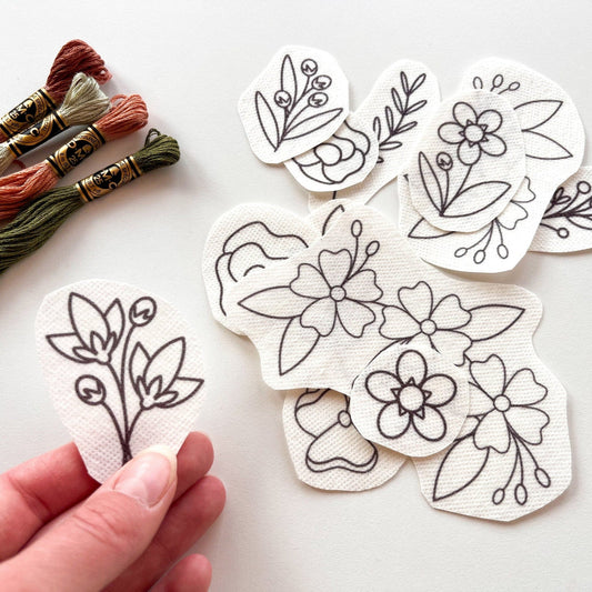 Floral hand embroidery designs printed on fabric stabiliser