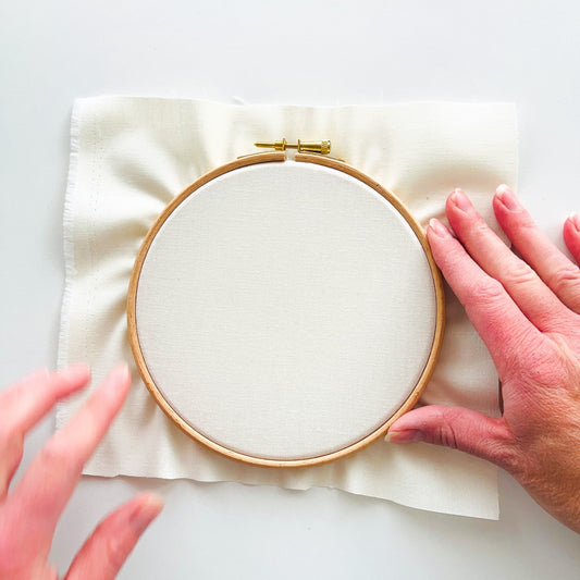 wooden embroidery hoop with fabric