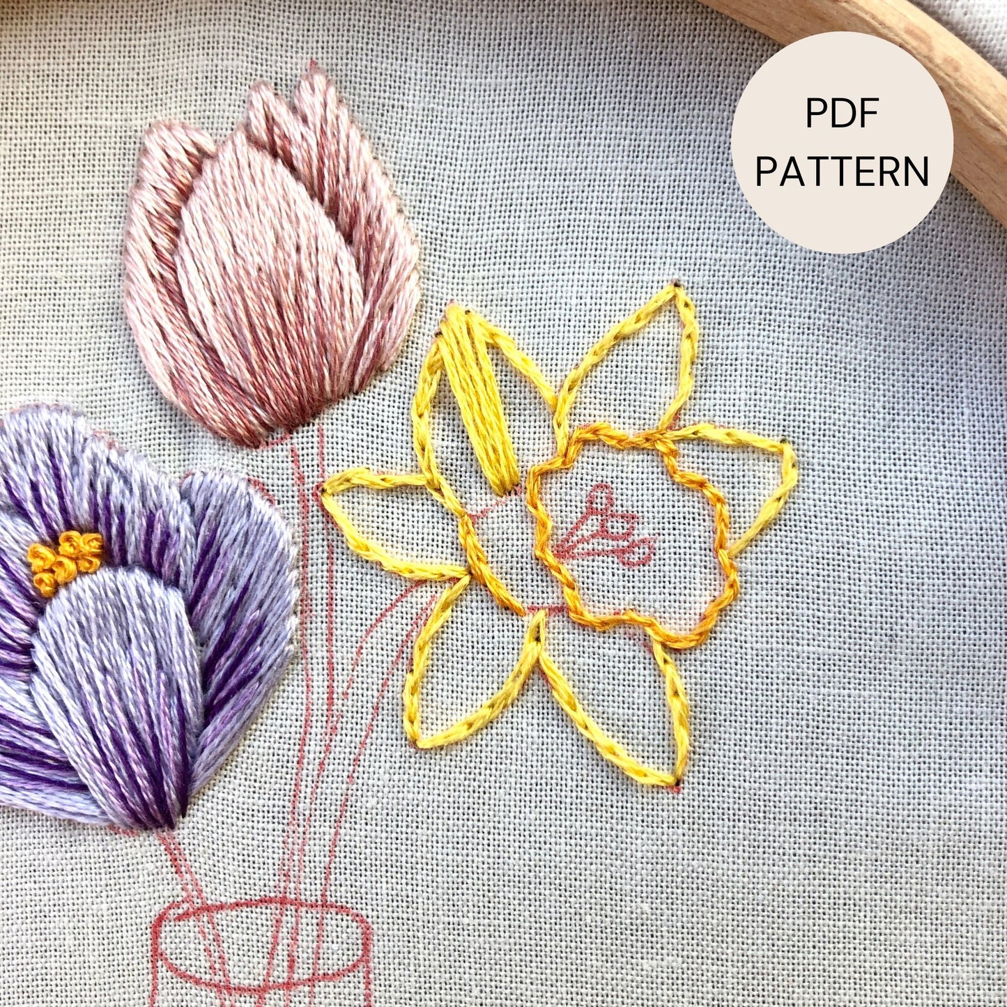 Close up of Daffodil in the process of being hand stitched.